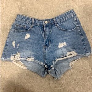 High waisted denim shorts with rips